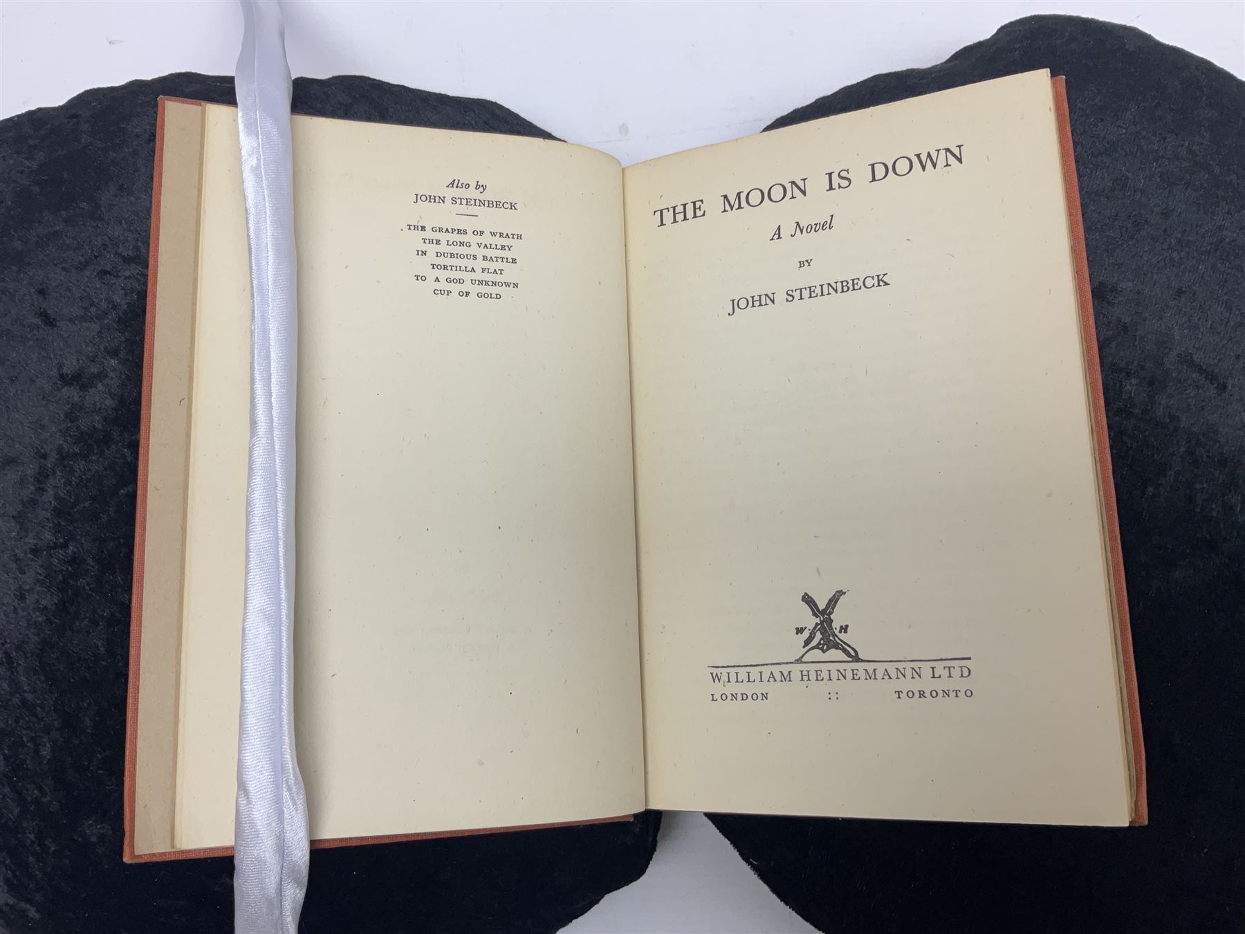 John Steinbeck; Of Mice and Men, first edition, second printing, New York: Covici Friede, 1937, 2nd printing with 'loosely' to page 9 and The Moon is Down, fist edition, Windmill Press, Surrey 1942