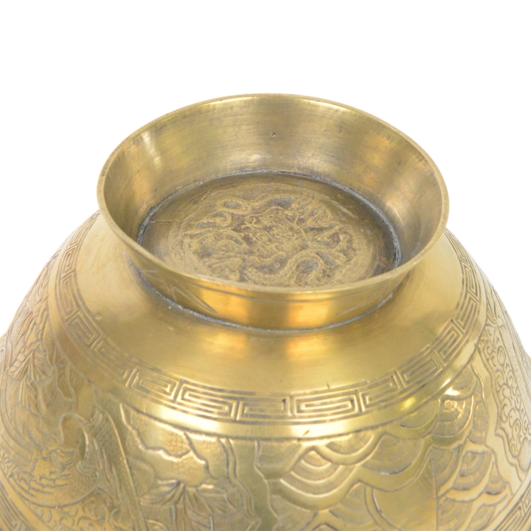 Chinese brass bowl, decorated to the outside with dragons,  upon a circular base, cast seal mark to base, D26cm