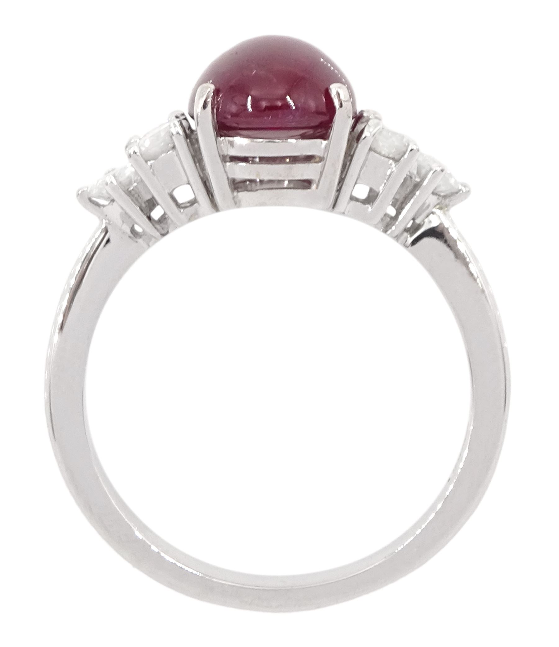 18ct white gold cabochon cut ruby and six stone round brilliant cut diamond ring, hallmarked, ruby approx 3.70 carat, total diamond weight approx 0.55 carat