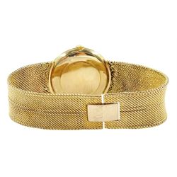 Omega gentleman's 9ct gold manual wind wristwatch, Cal. 601, silvered dial with baton hour markers, London 1969, on integral 9ct gold strap, hallmarked