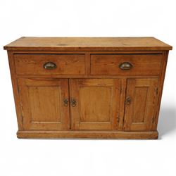 Early 20th century pine sideboard, rectangular top over two frieze drawers with cup handle...