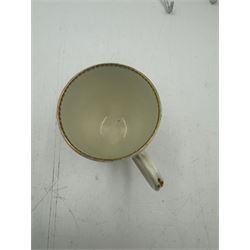 18th century Caughley blue and white sparrow jug, decorated in the Mother and Child pattern, circa 1780-1790, with underglaze C mark beneath, H9cm, together with a Worcester coffee cup, circa 1785 painted with floral sprays in underglaze blue and gilt, with crescent mark beneath, and a Caughley trio of tea cup, tea bowl and saucer, each of moulded wrythen fluted form and decorated with gilt and blue sprigs and bands, each with crescent mark beneath, (5)