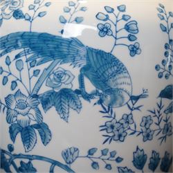 Pair of table lamps of baluster form, decorated with exotic birds up fruiting trees, on hardwood pedestals, H55cm including shades