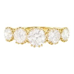 18ct gold diamond ring, set with five graduating round brilliant cut diamonds, stamped 750...