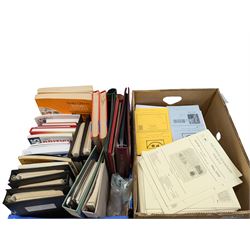 Stamp and coin reference materials, including Stanley Gibbons 2023 'Great Britain Concise' stamp catalogue, various editions of 'The Postal Stationary Society', empty stamp albums etc, in two boxes
