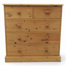 Solid pine chest, fitted with two short and three long drawers