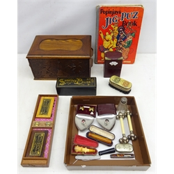  19th century 'Amber Pure' cheroot holder in case, another pipe holder, pair Danish stainless steel candle holders, knife rests, pair Stratton cufflinks, leather playing card case, Victorian advertising lacquer polish box & Berry's Diamond brush, vesta case, Popinjay's Jig-Puz etc in a carved oak box  