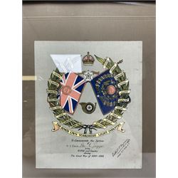 WW1 chromolithograph print of a battle scene with French and German soldiers in a wood, entitled 'De Wereldoorlog 1914-18 Slag Van Houthulst' 35 x 49cm, oak frame; and a framed WW1 regimental testimonial to 49744 Pte. E. Jagger KOYLI, gilt frame (2)