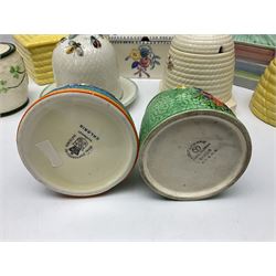 Clarice Cliff for Wilkinson Ltd Crocus Bizarre beehive honeypot painted in the Crocus pattern, together with two beehive Beswick honey pots, Poole square honey pot etc (14)