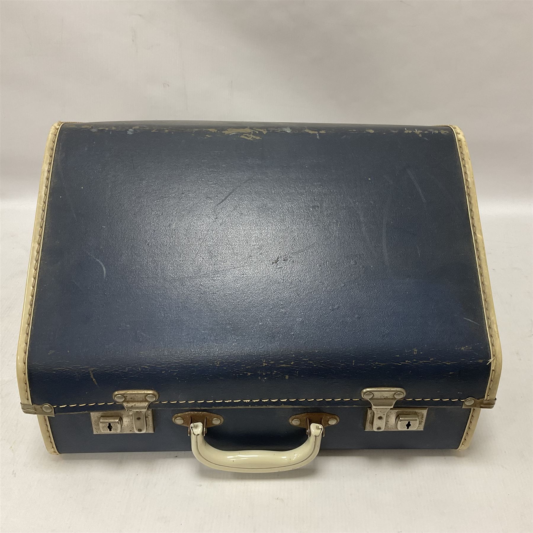 German Hohner student II compact accordion with 26 keys and 12 bass registers in a hard case With tutor