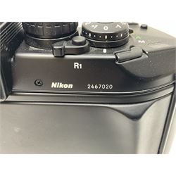 Nikon F4 camera body, serial no. 2467020, with Nikon MB-21 battery pack