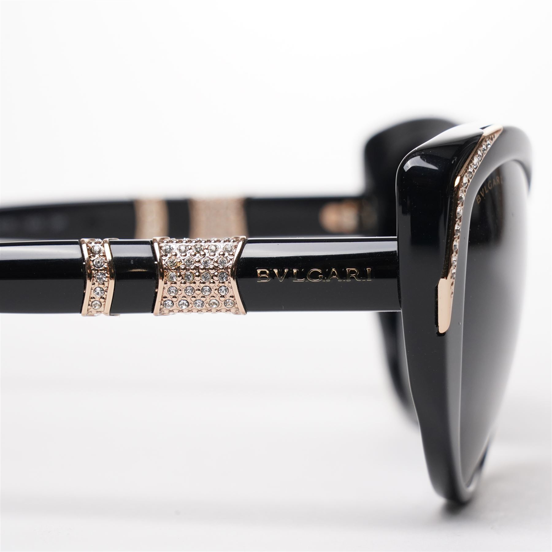 Bulgari - pair of oversized cat-eye sunglasses, with gradient tinted lenses in a black frame, the temples and arms with gold-tone hardware inset with pave-jewelled hinge detail, with original cloth pouch, hard leather case and box