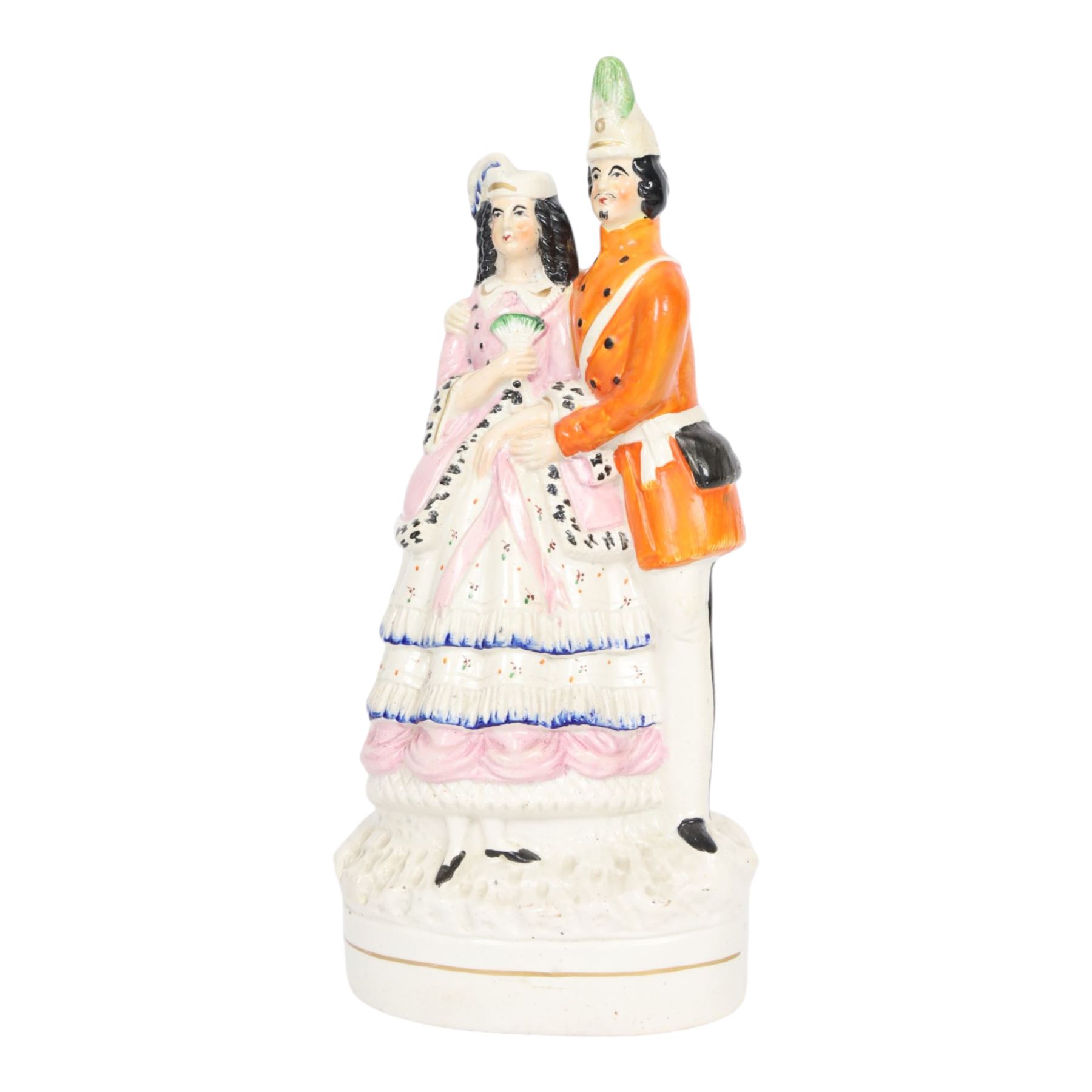 Rare Staffordshire figure group, Princess Helena and Prince Christian of Schleswig-Holstein, circa 1866, she with right arm across chest holding a fan, wearing a plumed hat, he with arm around her shoulder, wearing military uniform, H30.5cm