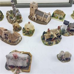 Eighteen Lilliput lanes, including Lundy Lighthouse, Bluebell Wood, St Marys, Winsor Cottage etc, all with original boxes and four limited edition Lilliput Lane prints 