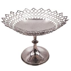 Early 20th century silver pedestal bon bon dish, of circular form, with pierced quatrefoil lattice work design sides and shaped rim, upon circular spreading beaded foot and knopped stem, H10.6cm, hallmarked Walker & Hall, Sheffield 1912