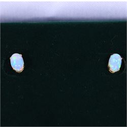 Pair of 9ct gold oval opal stud earrings, boxed