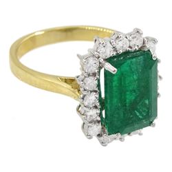 18ct gold emerald and diamond cluster ring, single octagonal cut emerald of approx 3.80 carat, with round brilliant cut diamond surround, hallmarked, total diamond weight approx 0.50 carat