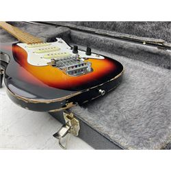 Fender style sunburst electric guitar with manuscript mark 'Zenta Stratocaster 1963' L97cm; in hard carrying case; another similar unmarked sunburst electric guitar; in gig bag; and Fender Frontman Amplifier, serial no.M473406 (3)