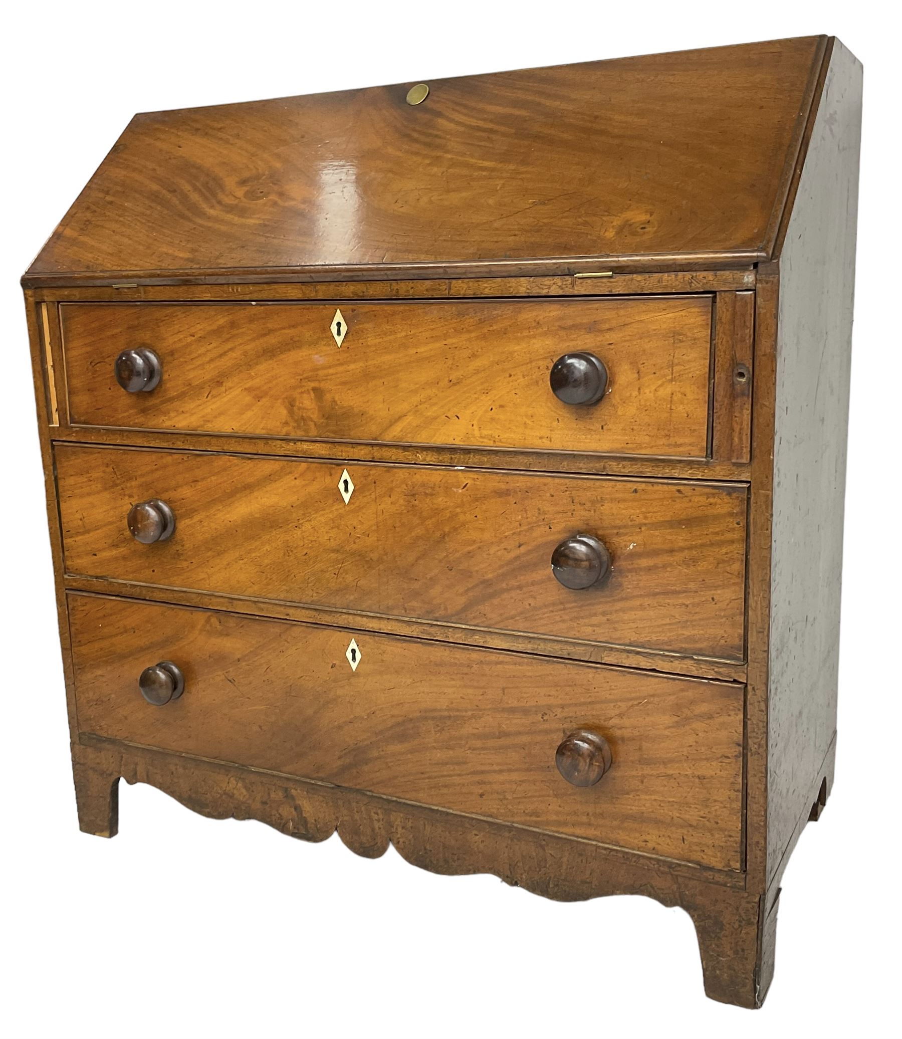 George III mahogany bureau, the fall front enclosing interior fitted with pigeon holes, drawers and cupboard, three graduating drawers below, with ivory escutcheons, shaped apron on bracket feet 

This item has been registered for sale under Section 10 of the APHA Ivory Act
