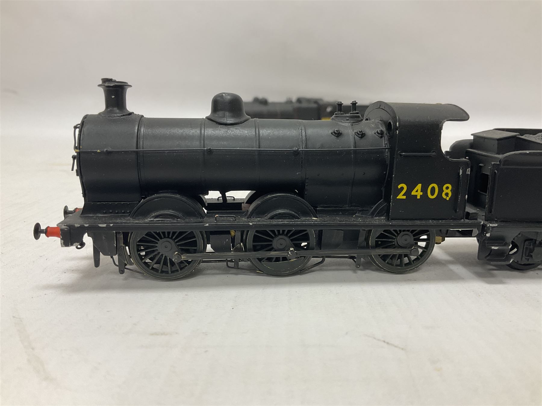 ‘00’ gauge - three kit built locomotive and tenders comprising Class D21 4-4-0 no.1242 finished in NER black with LNER tender; Class C4 4-4-2 no.5262 finished in LNER black; Coal Engines Class 0-6-0 no.2408 finished in black with Millholme Models LNER tender (3) 