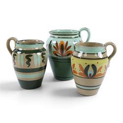 Eight Hartrox and Dee Cee Stoneware jugs, all with floral and abrstact decoration, with printed marks beneath, tallest H24cm