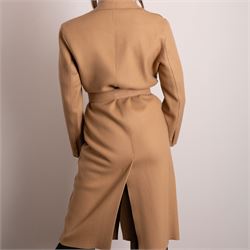 Amanda Wakeley London - full-length coat in camel wool, with notched lapels, concealed front fastening, self-tie belt, and side slip pockets, of minimalist tailored form, from the 'Petite Chic' line, unused