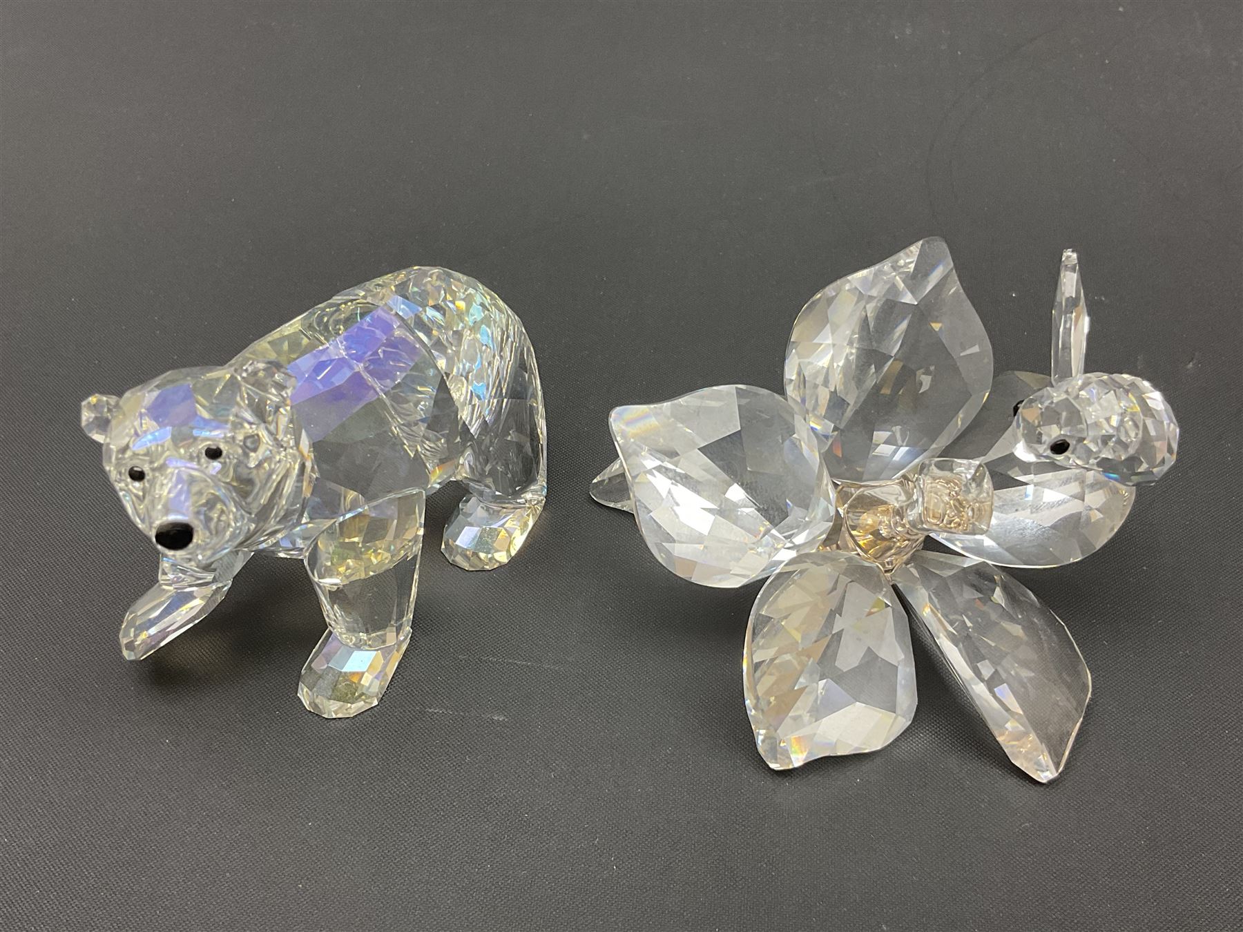 Twenty nine Swarovski Crystal animals, to include koala and baby, in frosted tree branch, elephants, polar bears, squirrel, monkeys, panda, unicorn and snails, etc 