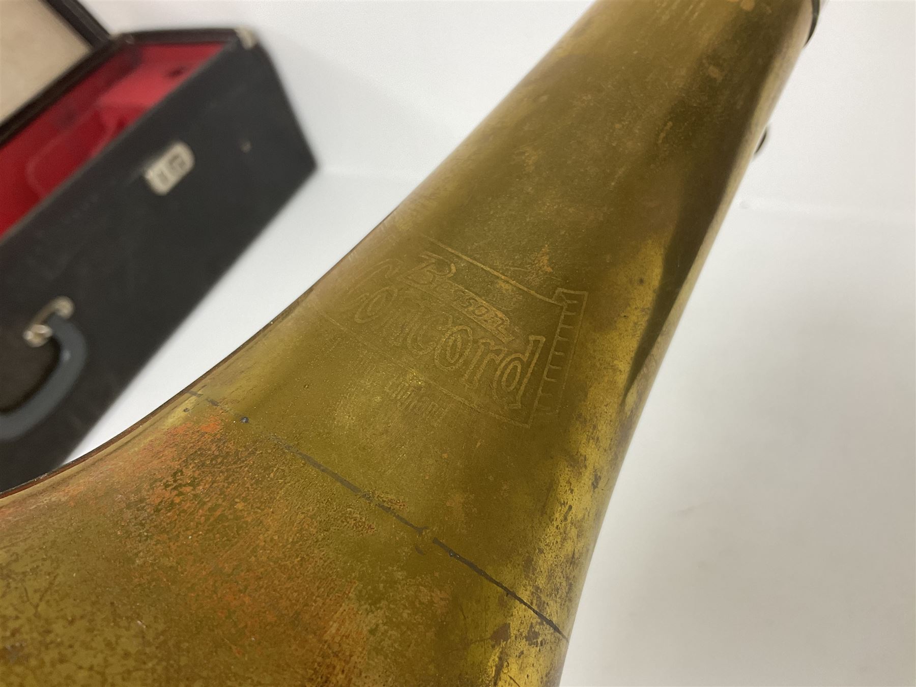 Three brass trombones comprising Elkhart Ind. USA 'CONN' model no.72H; Besson 'Concord'; and Selmer Distributed 'Lincoln'; two in carrying cases; and German B & M 'Champion' brass trumpet (4)