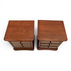 Willis & Gambier - mahogany pair of bedside cabinets, with frieze drawer with blue baize lined interior, panelled sides and three drawers raised on bracket feet