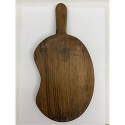 Mouseman - oak kidney-shaped cheeseboard, the handle caved with mouse signature, by the workshop of Robert Thompson, Kilburn 