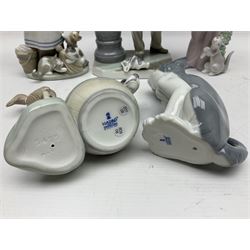 Five Lladro figures, including The Lamp Lighter no 5205,  Girl and Kittens no 6102, Cat no 5113 etc