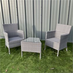 Pair of rattan garden armchairs and matching side table with glass top - THIS LOT IS TO BE COLLECTED BY APPOINTMENT FROM DUGGLEBY STORAGE, GREAT HILL, EASTFIELD, SCARBOROUGH, YO11 3TX
