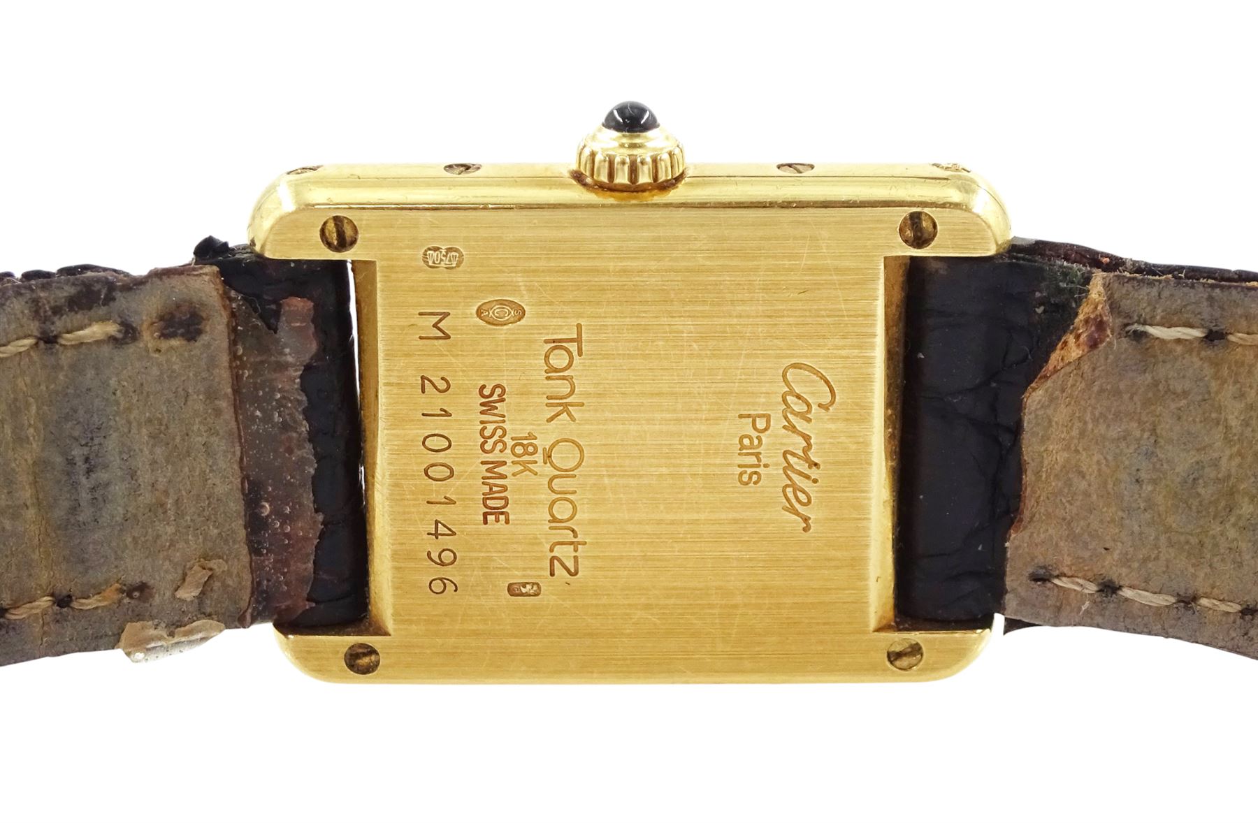 Cartier Tank ladies 18ct gold quartz wristwatch, back case No. M 21001496, white dial with Roman numeral hour markers, on black leather strap with 18ct gold buckle, both by Cartier, hallmarked