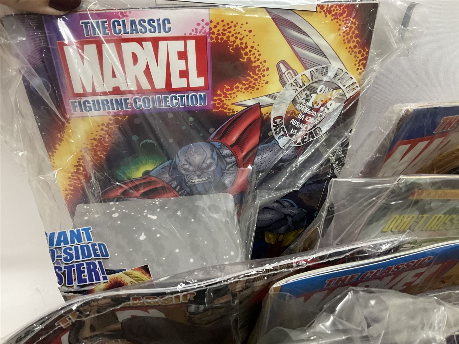 Eaglemoss The Classic Marvel Figurine Collection - forty-one magazines with models each as issued in unopened plastic bags; eleven boxed models and eight loose periodicals; in three boxes (60)