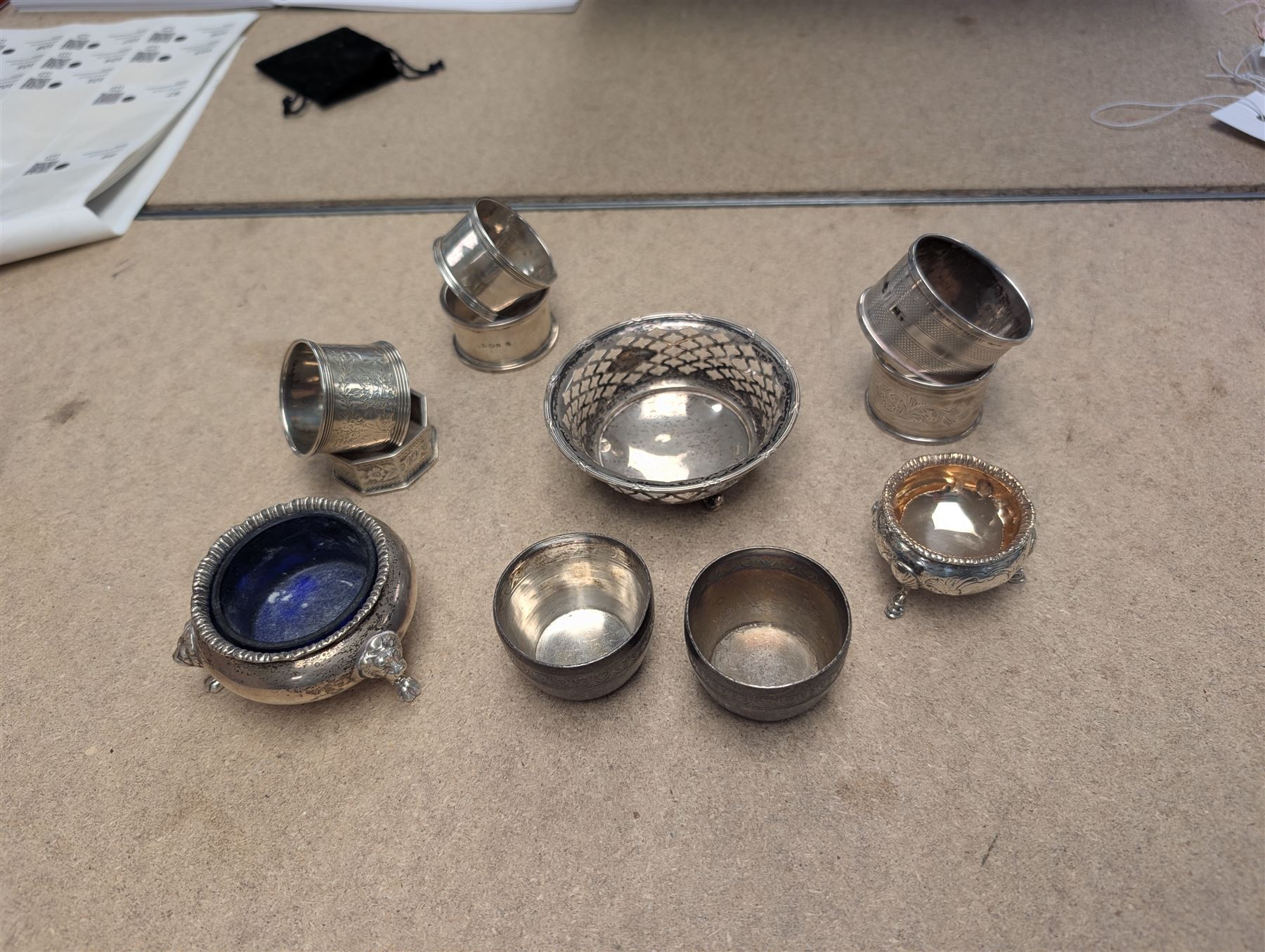 Group of silver, comprising napkin rings, open salts, egg cups, etc all hallmarked 