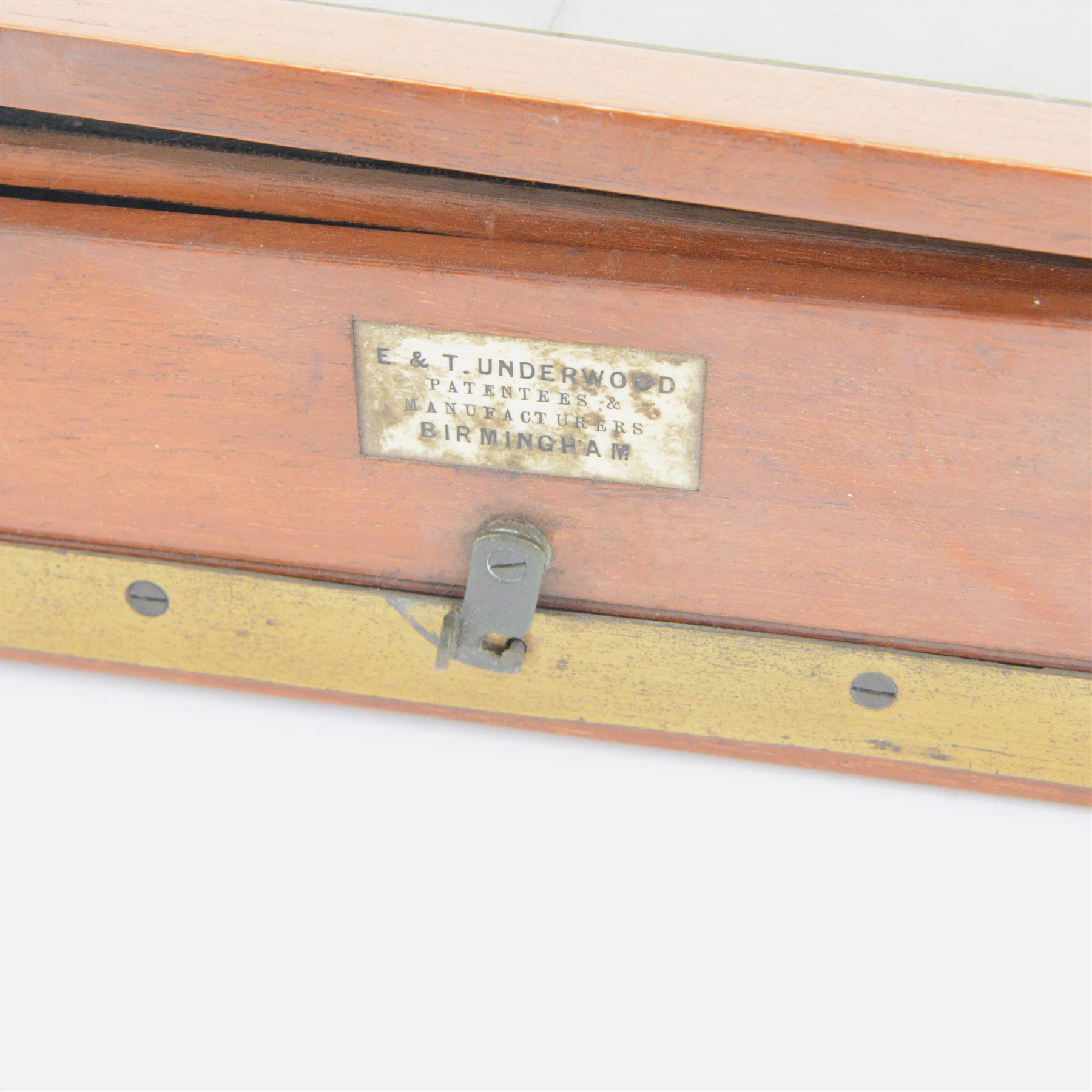UNABLE TO SELL Two mahogany and brass half plate cameras, comprising E & T Underwood camera and a Taylor's Drug Co. Ltd 'The Albion' camera, each with Thornton Pickard 'Snap Shot' lenses, all with ivory maker's plaques, with a glass plate and a canvas carry case