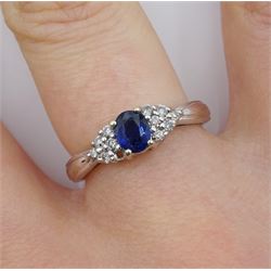 18ct white gold oval sapphire and diamond cluster ring, hallmarked, sapphire approx 0.50 carat