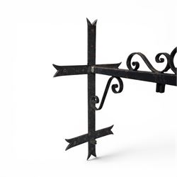 Antique wrought iron sign bracket, with strapwork scroll decoration and arrow form support, in weathered black painted finish