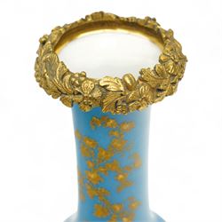 19th century French porcelain vase in the manner of Sevres, the reserves painted with birds within a landscape and floral bouquets, on a turquoise ground with gilt highlights, with ormolu style gilt metal collar and base, H26cm