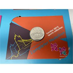 Queen Elizabeth II United Kingdom London 2012 Olympic commemorative fifty pence collection comprising twenty-nine coins and completer medallion, in official collector album