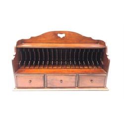  Mahogany stationary cabinet, pierced arched top, top above shaped letter divisions and three short drawers with brass carry handles, L60cm x H35cm  