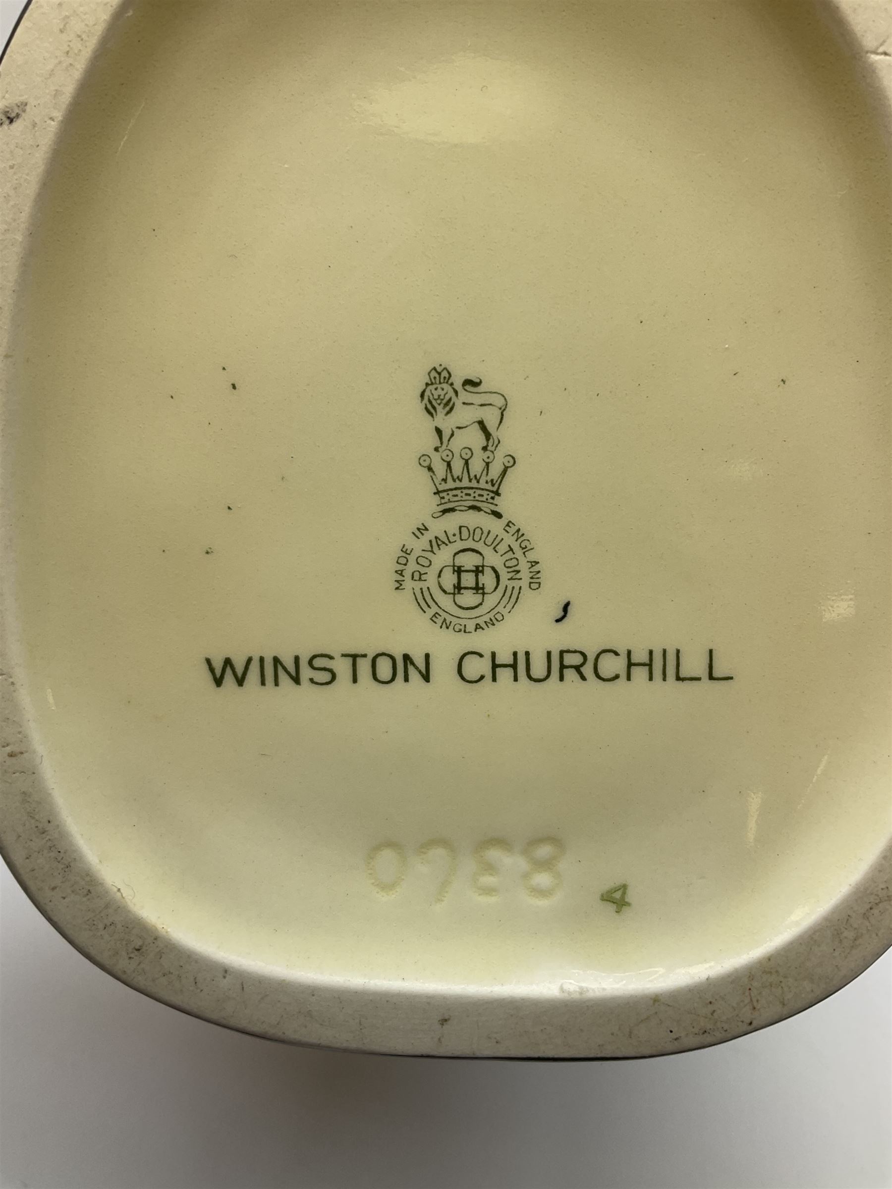 Royal Doulton toby jug of Winston Churchill H23cm and large character jug of Falstaff; together with four collector's plates by Royal Crown Derby, Royal Worcester and Limoges (6)