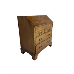 George III mahogany and walnut bureau, fall-front concealing six pigeonholes and four drawers with central compartment with sliding lid, fitted with two short and two long drawers, on bracket feet
