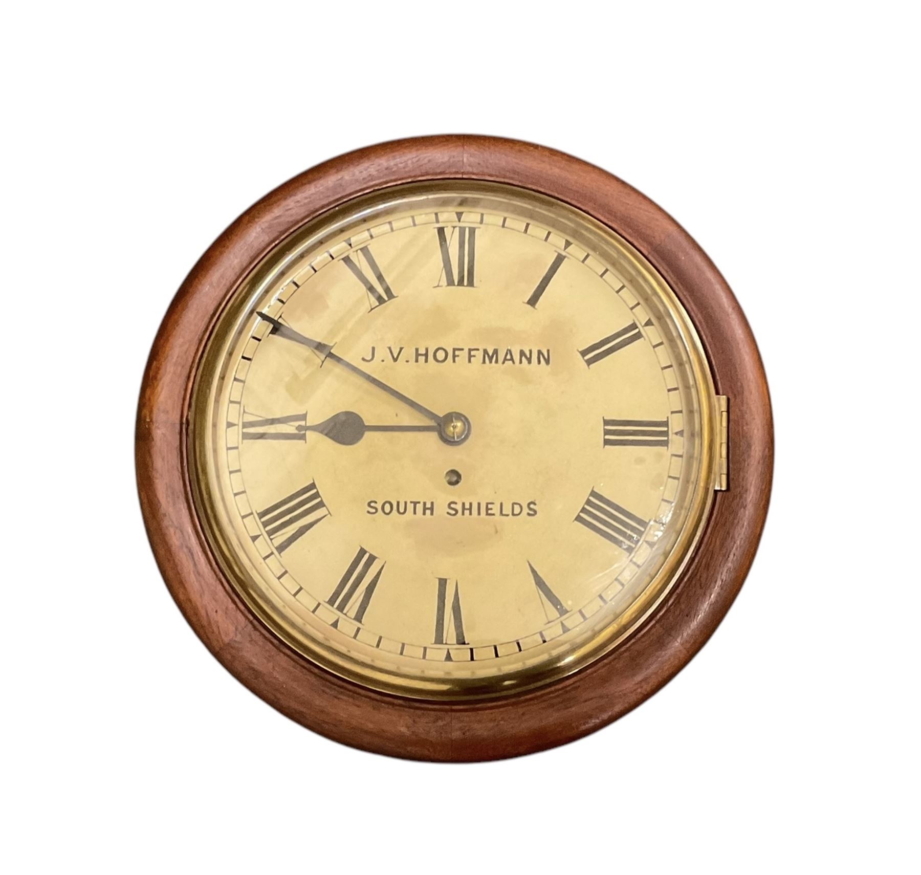 Jens Von Hoffmann of South Shields - Late 19th century 8-day fusee wall clock with a mahogany dial surround and cast brass bezel,  12” painted dial, with Roman numerals, minute track and spade hands,  with a four pillar timepiece chain driven fusee movement. With pendulum and key.
Case with later additions.