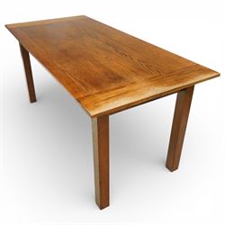 Late 20th century Mackintosh style oak dining table, rectangular top with broad plank surface over shaped frieze with twin pierced oval apertures, raised on square section supports