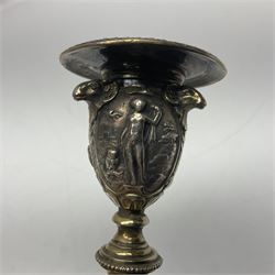 Pair of Victorian Elkington Mason & Co silver plated candlesticks, decorated in relief with ram masks and figures, H14cm