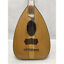 20th century Middle Eastern six string lute with a segmented back and a purpose designed hardwood stand