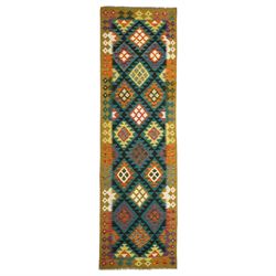 Maiman kilim, woven with an arrangement of multicoloured diamonds on a dark ground with co...
