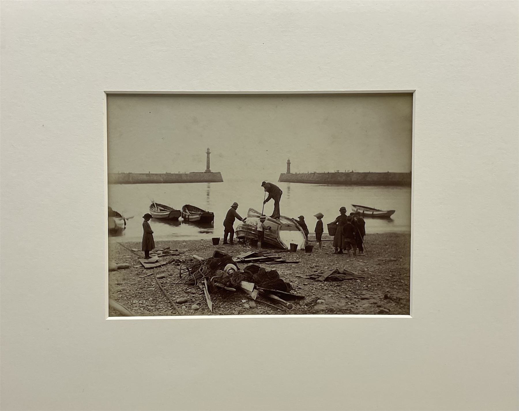 Frank Meadow Sutcliffe (British 1853-1941): Cleaning the Boat, albumen print c.1882 initialled and numbered 46 in the negative 15cm x 20cm (mounted)
Provenance: Witkin Gallery, New York; Sotheby's 25th April 1990 Lot 17; the Graham Nash Collection