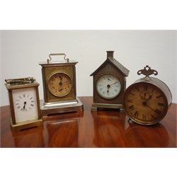  Early 20th century brass carriage timepiece, early 20th century drum alarm clock and two other clocks  
